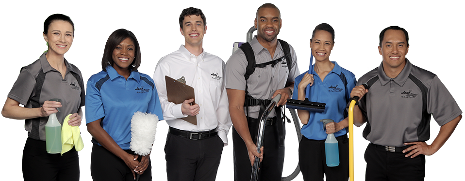 a group of people standing in front of a green screen
