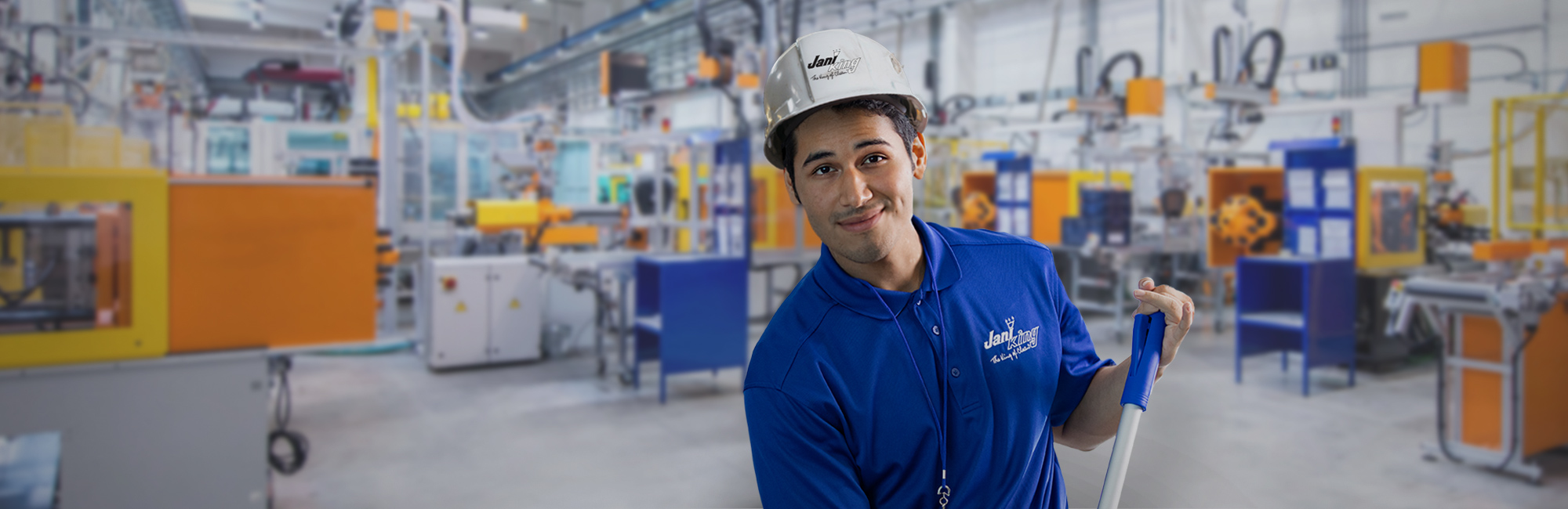 a man in a blue shirt and white hat