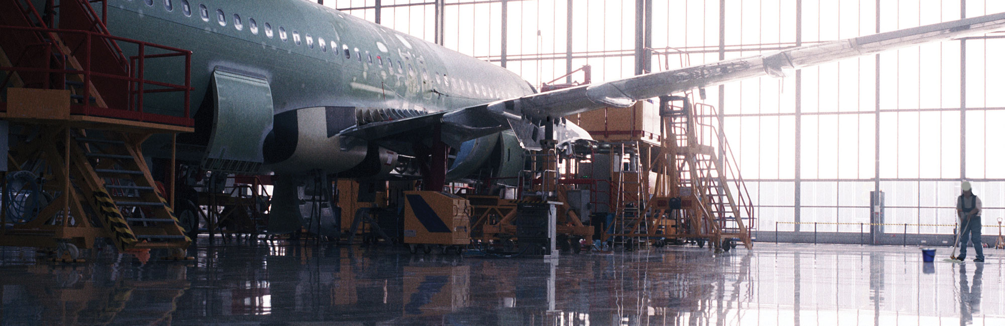 a large airplane in a large hangar